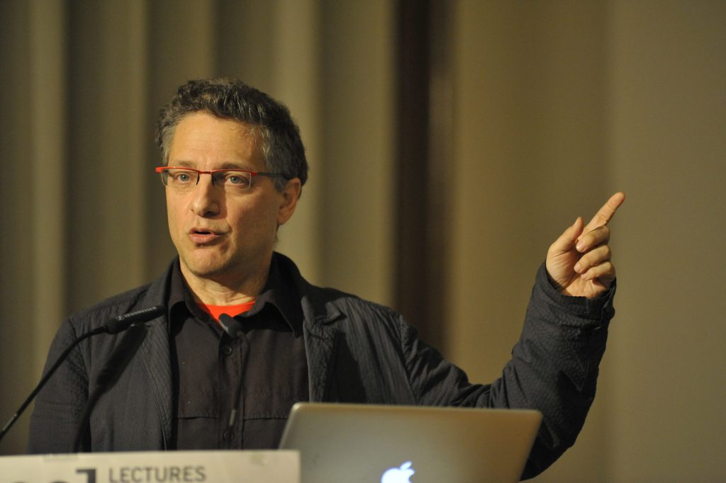Galison lectures from the podium