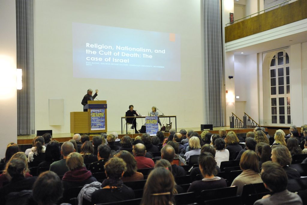 the audience listens