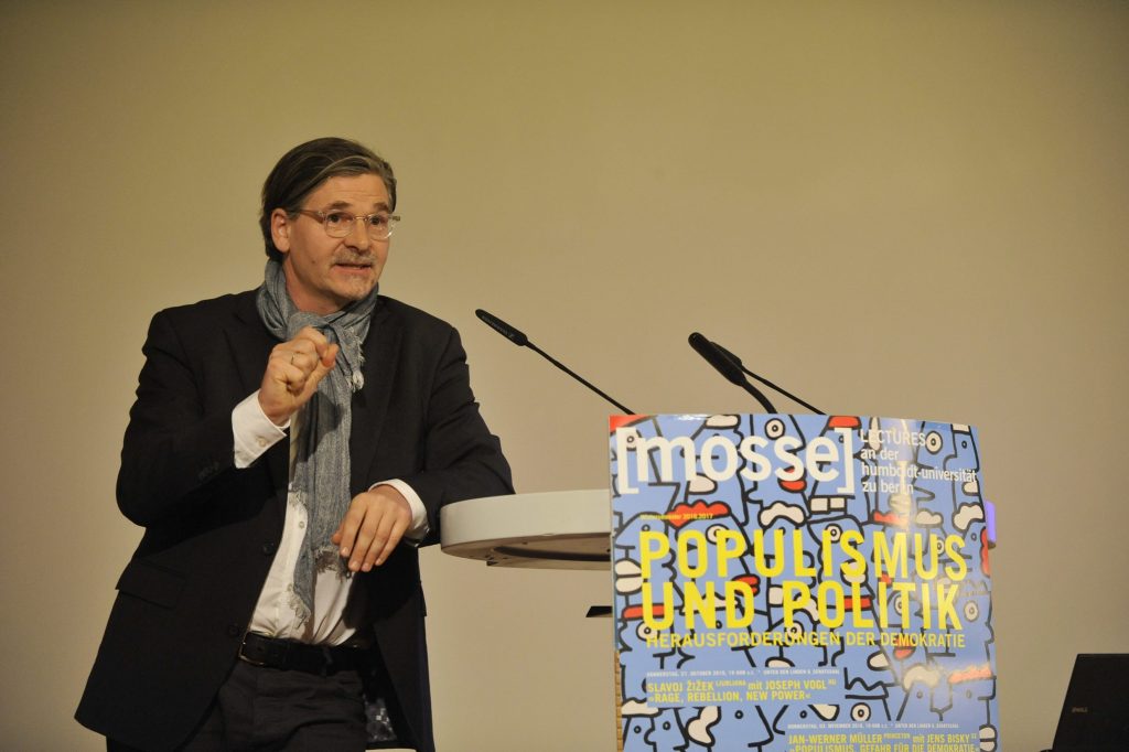 Jan Werner-Müller lectures from the podium