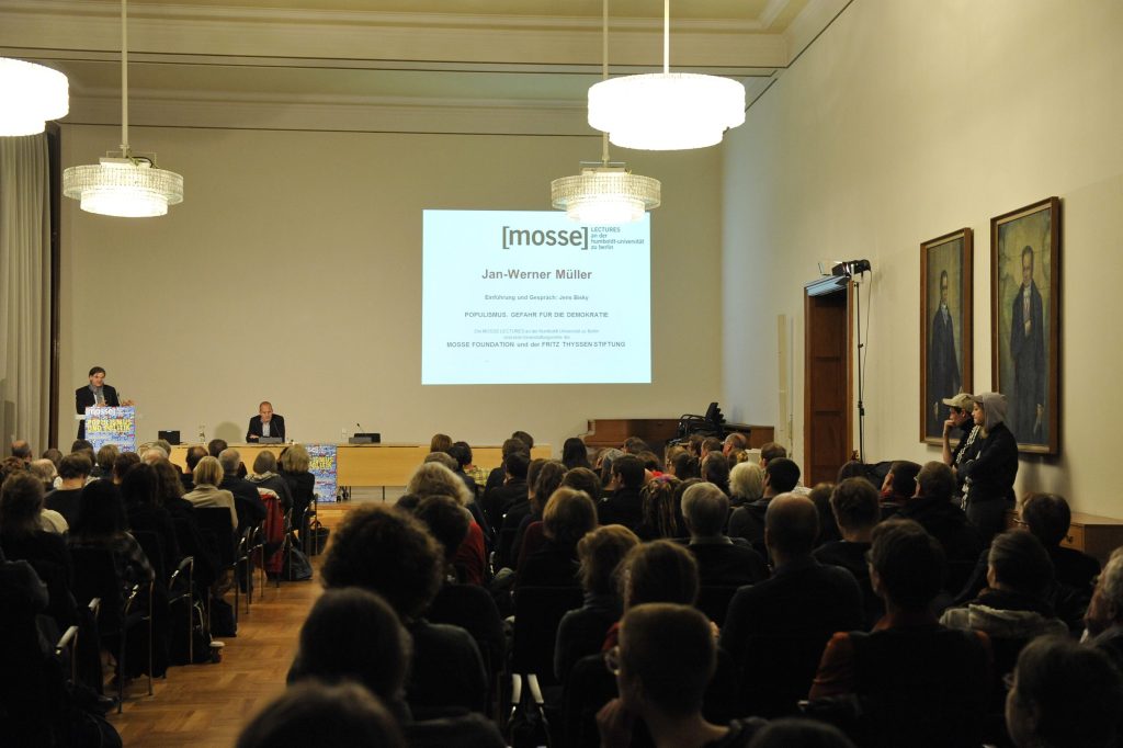 the audience listens to the lecture