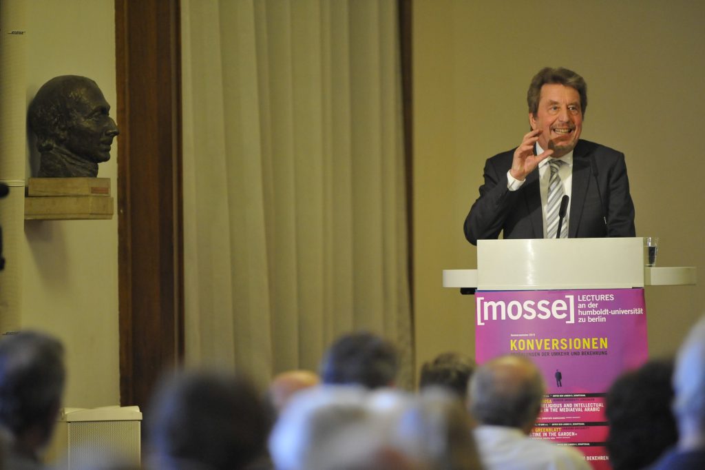 Joas lectures from the podium