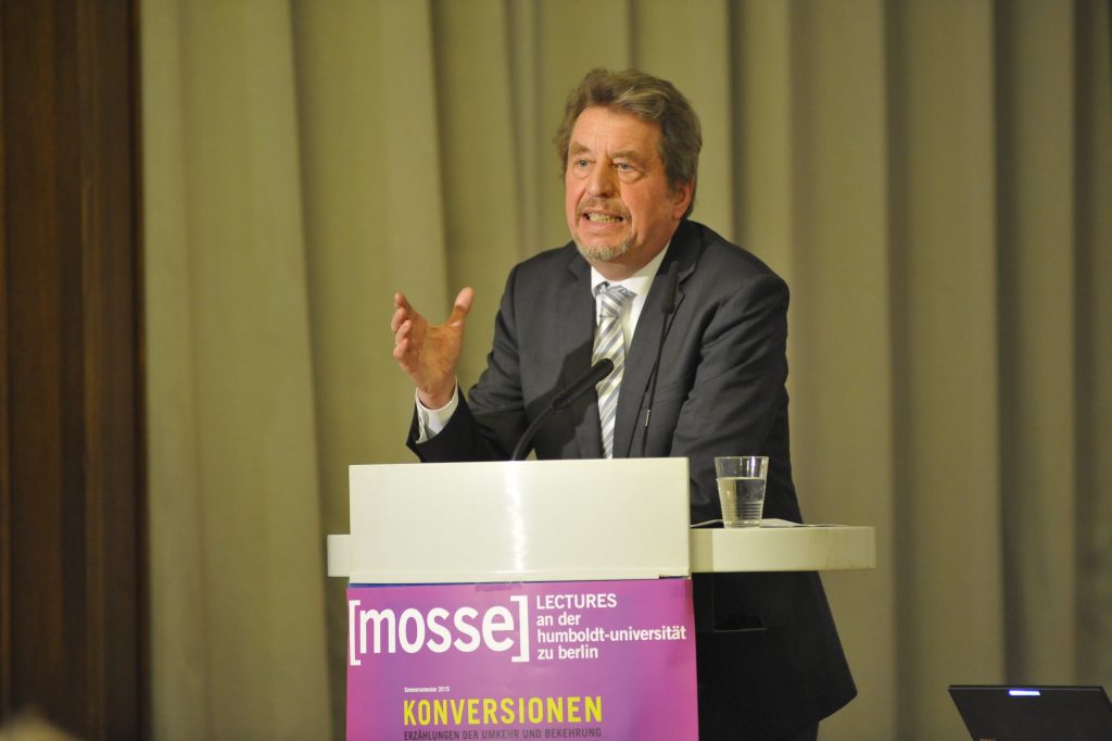 Joas lectures from the podium