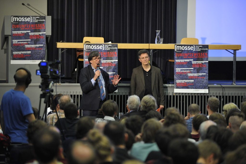 Latour and Schäffner address the audience