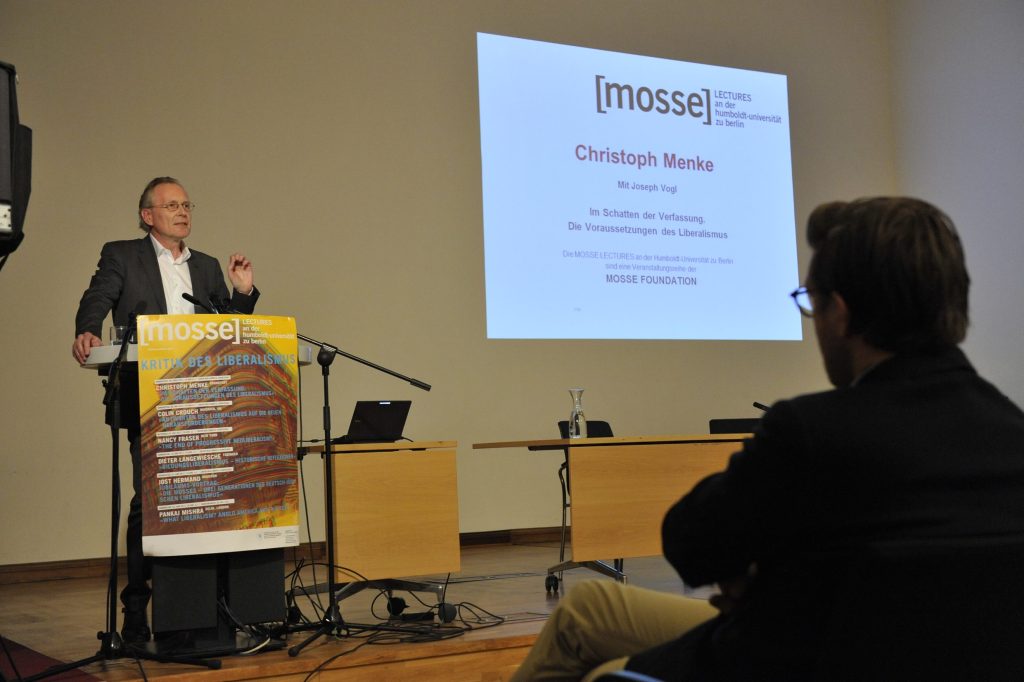 Menke begins his lecture