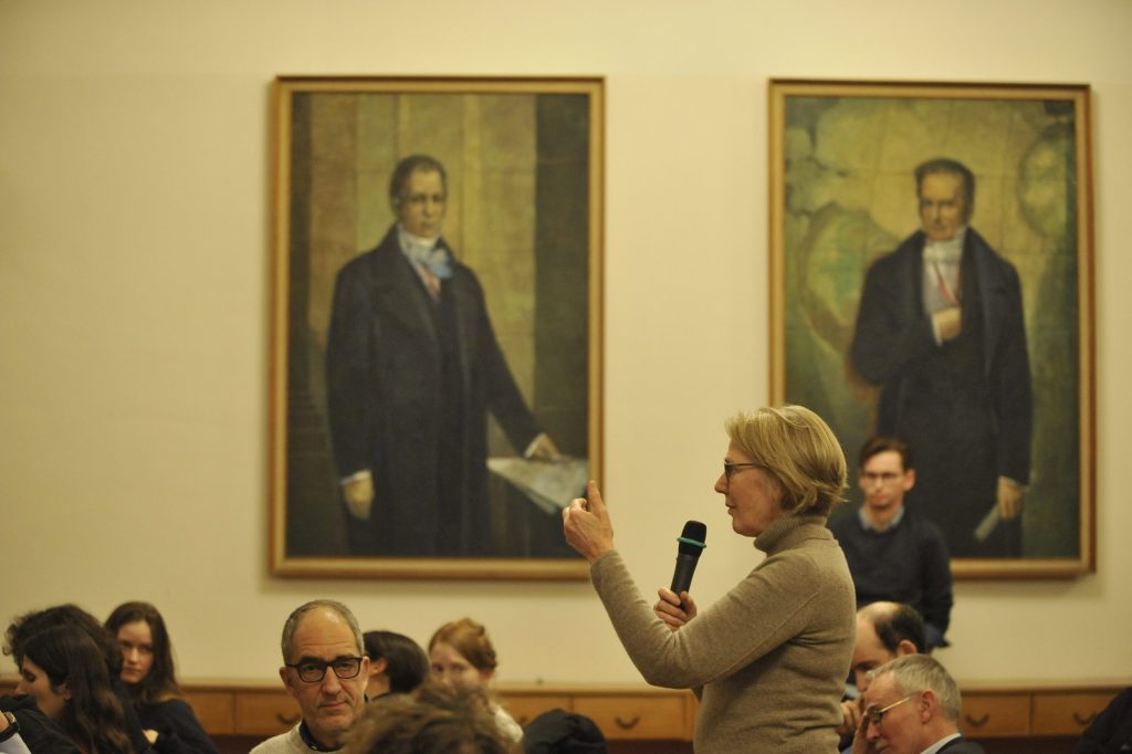 an audience member asks a question