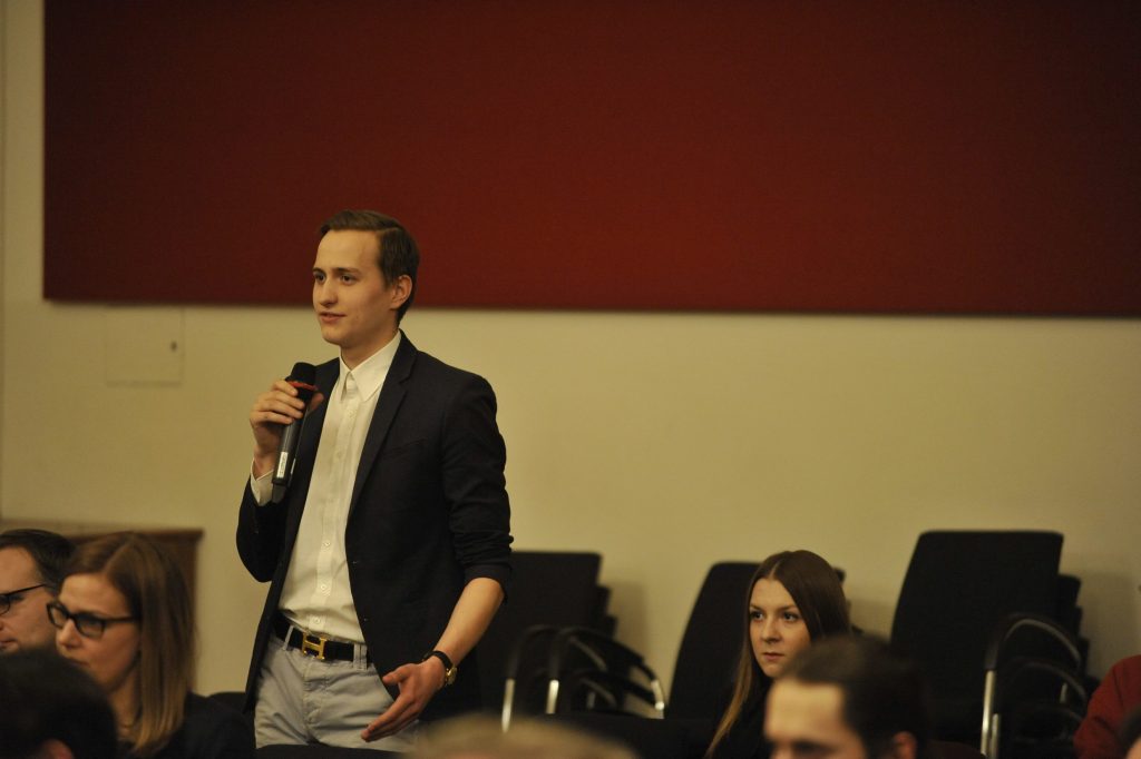 an audience member asks a question