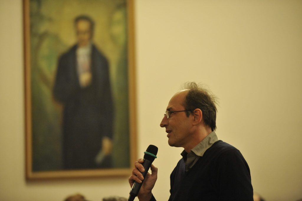 an audience member asks a question
