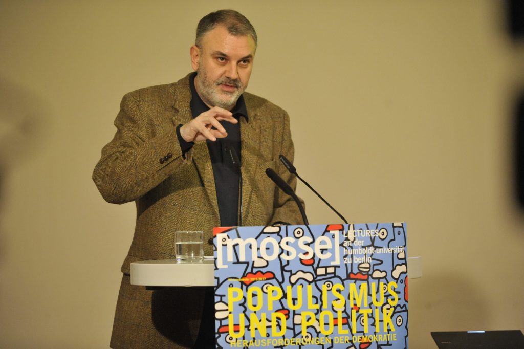 Stavrakakis delivers his lecture from the podium