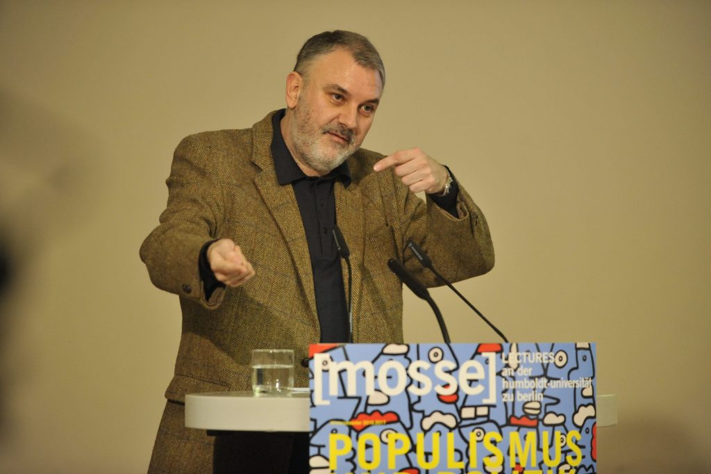 Stavrakakis delivers his lecture from the podium