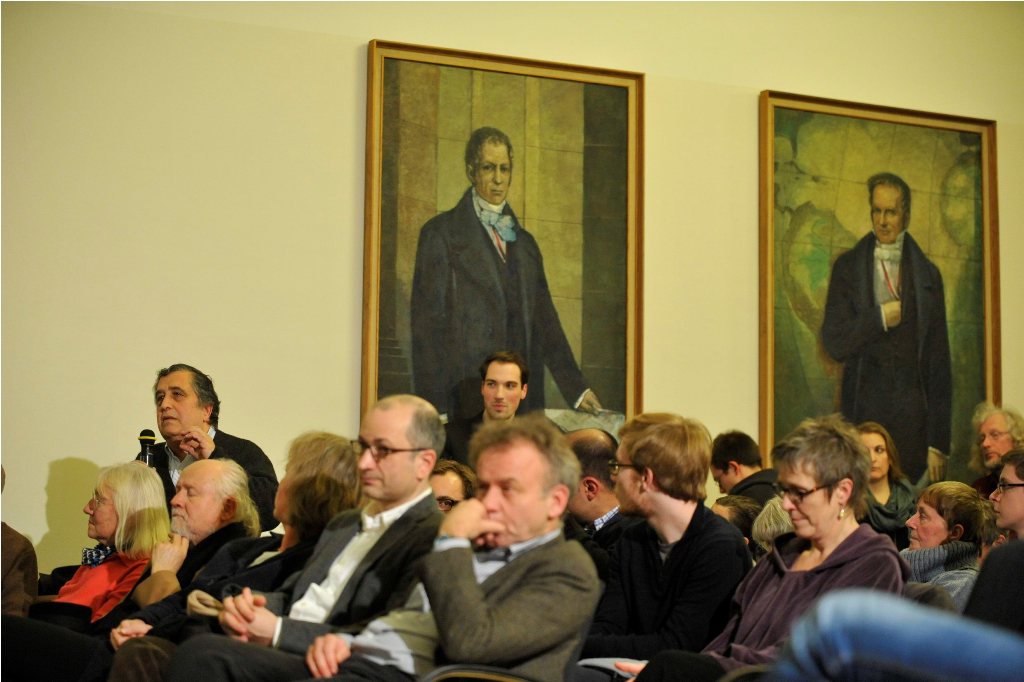 the audience listens
