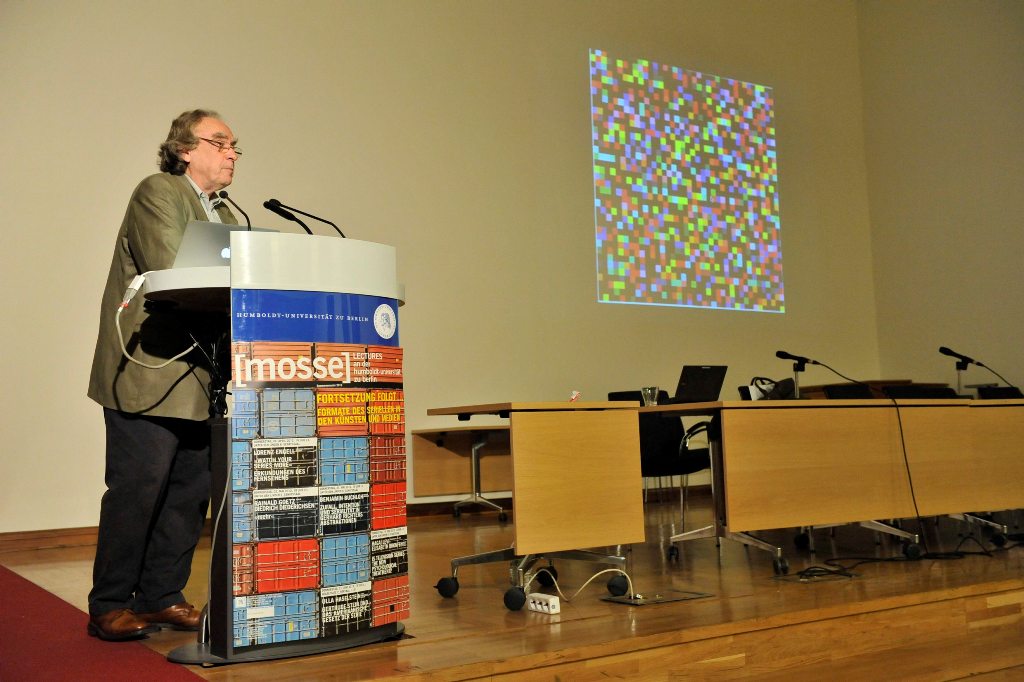 Buchloh lectures with an artwork by Richter projected in the background