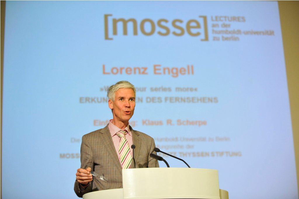 Engell lectures from the podium
