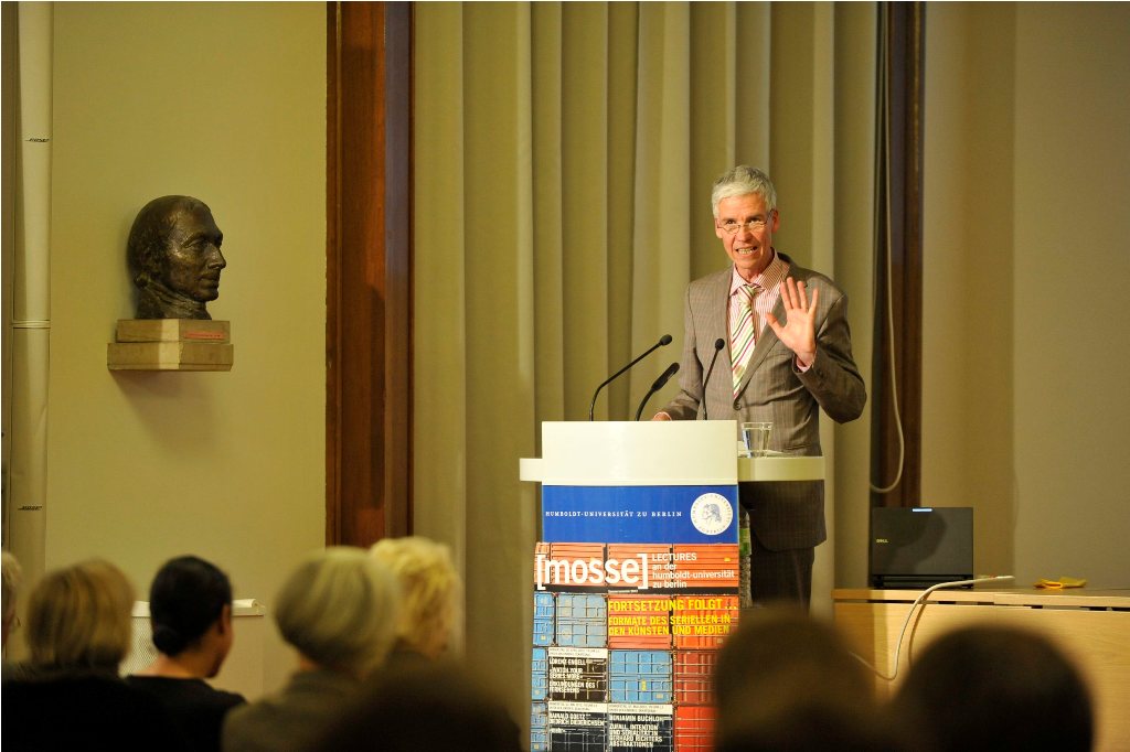 Engell lectures from the podium