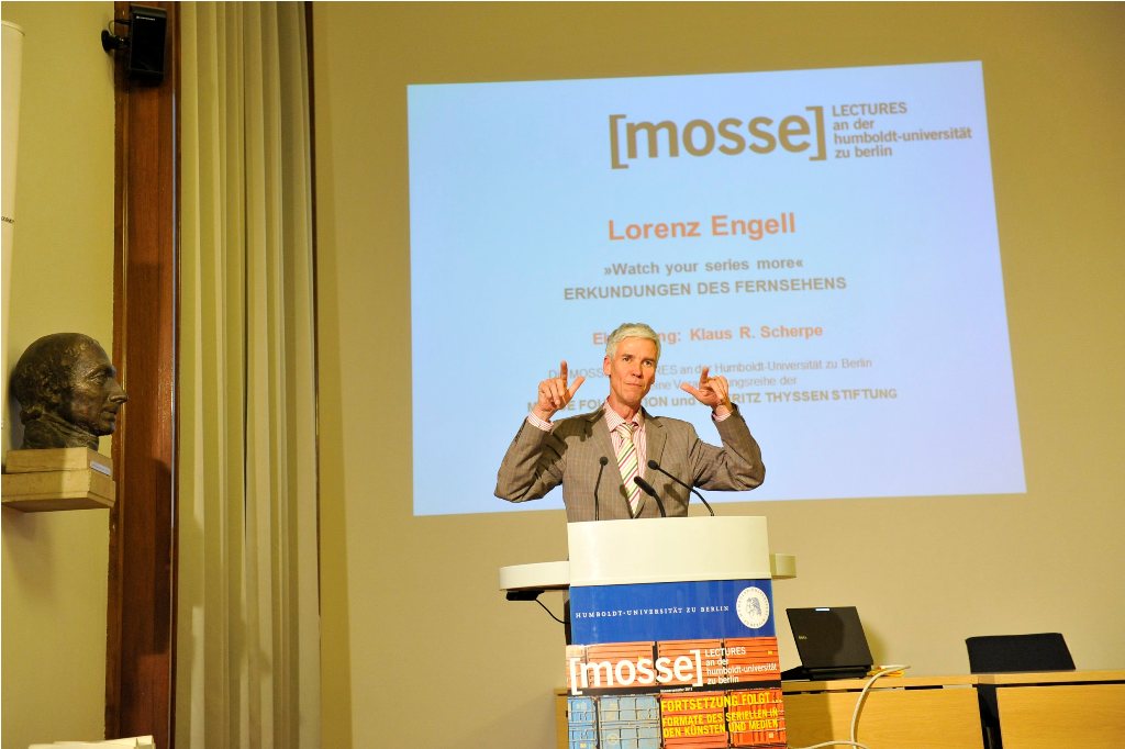 Engell lectures from the podium
