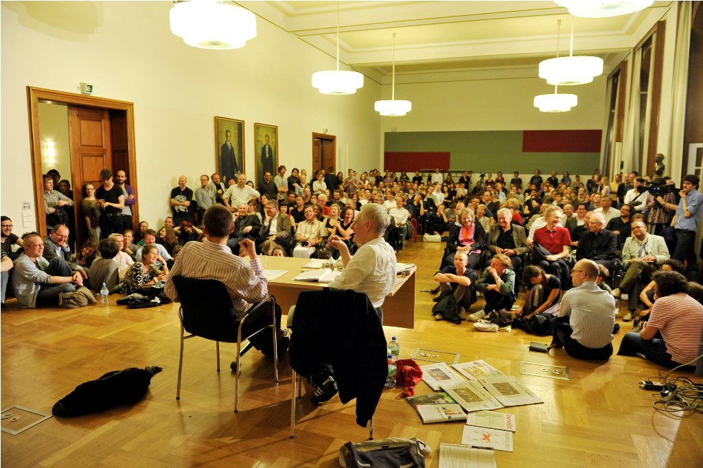 the audience watches