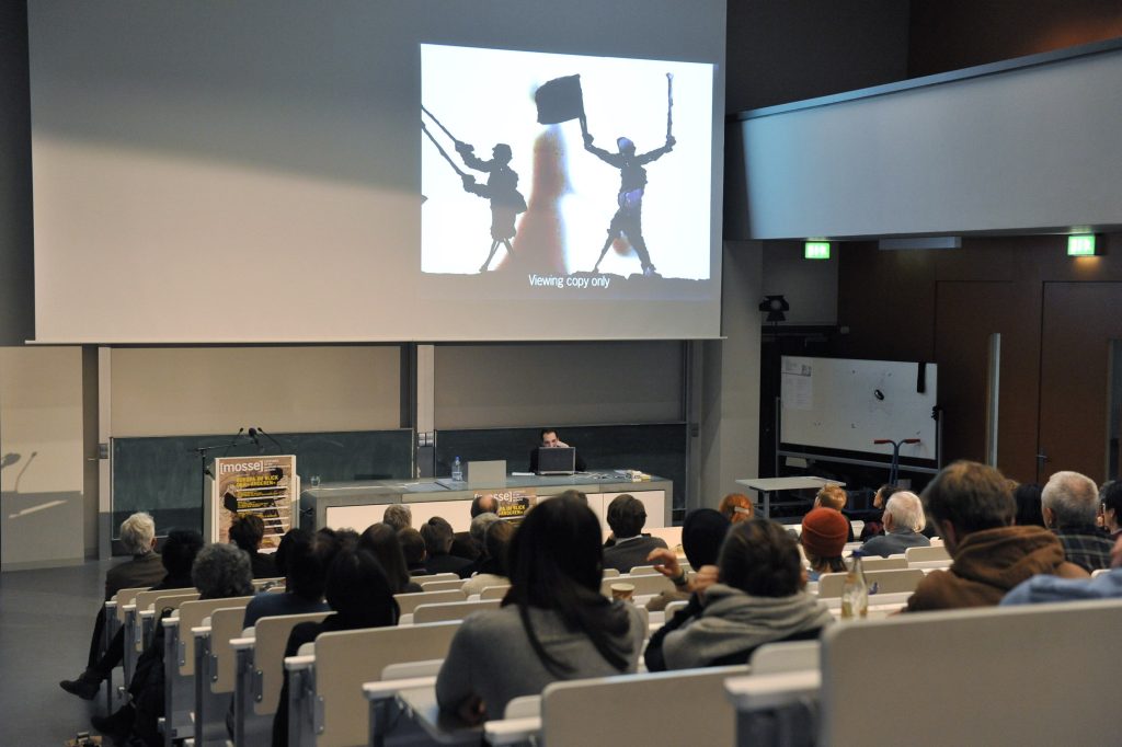 the audience listens