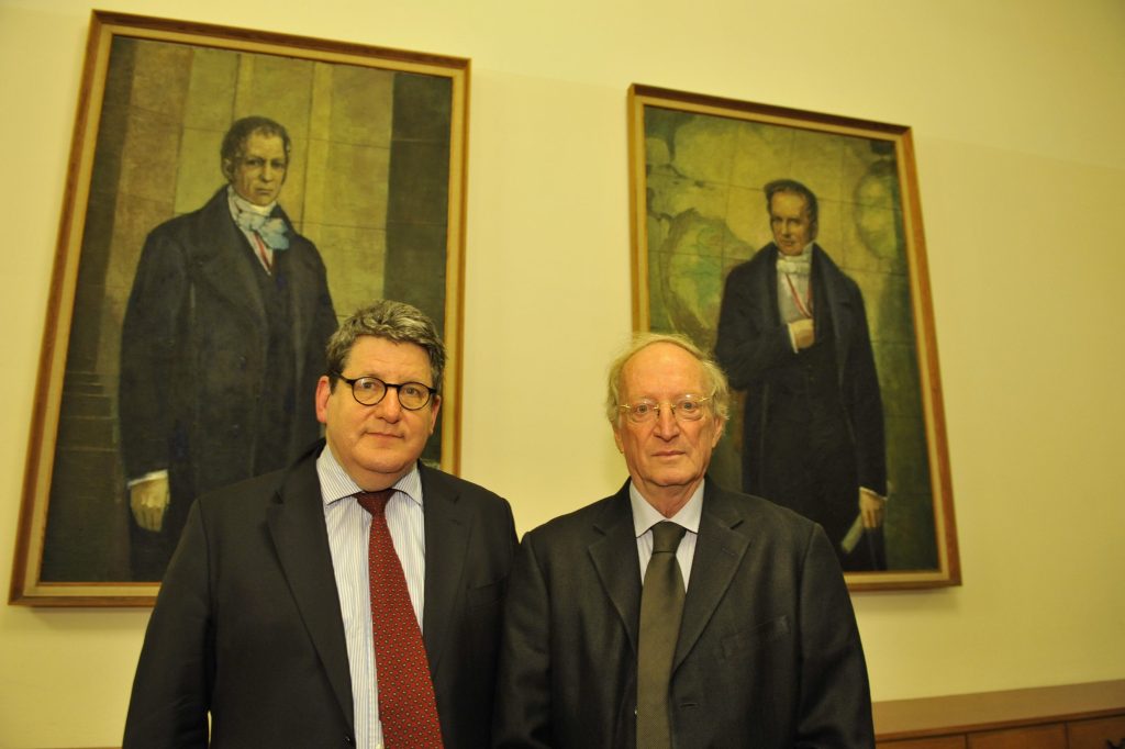 Margalit and Smith in front of the portraits of the Humboldt brothers