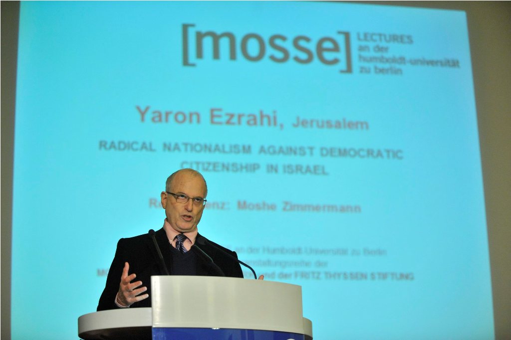Ezrahi lectures from the podium