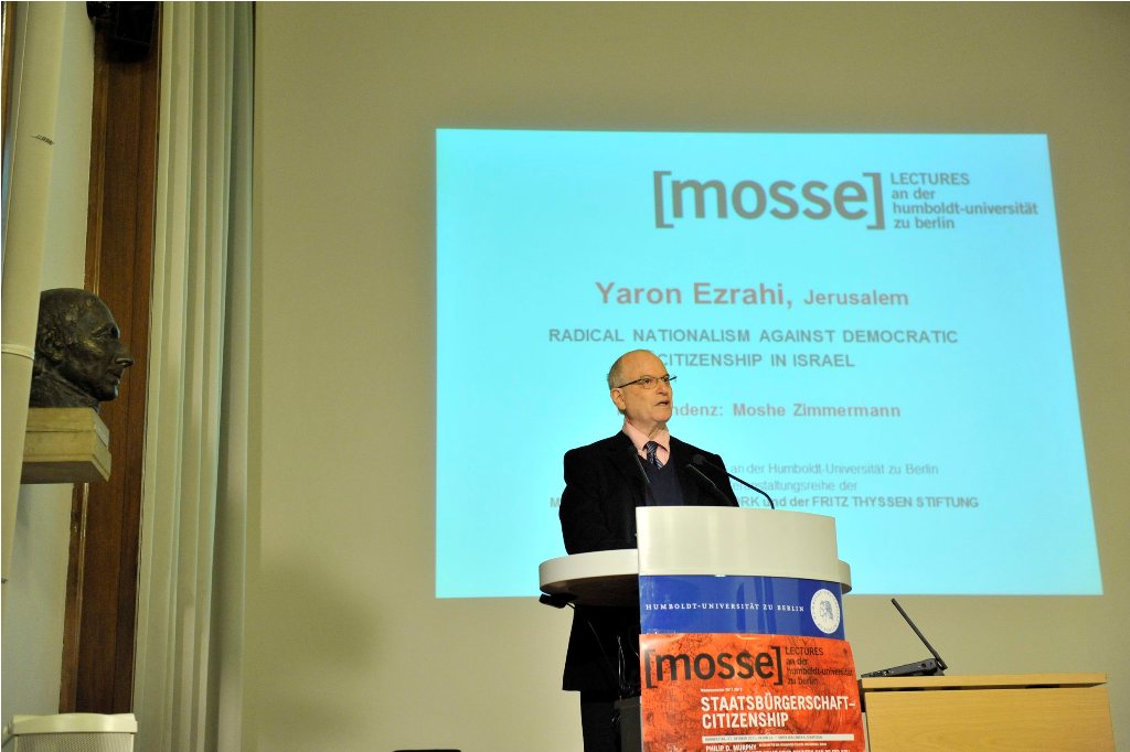 Ezrahi lectures from the podium