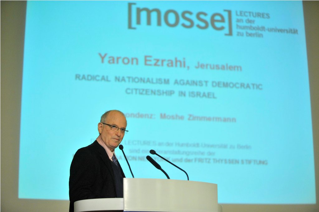 Ezrahi lectures from the podium