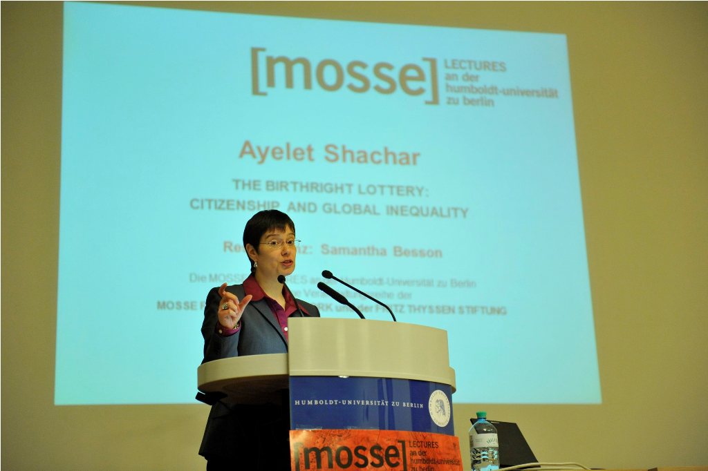 Schachar lectures from the podium