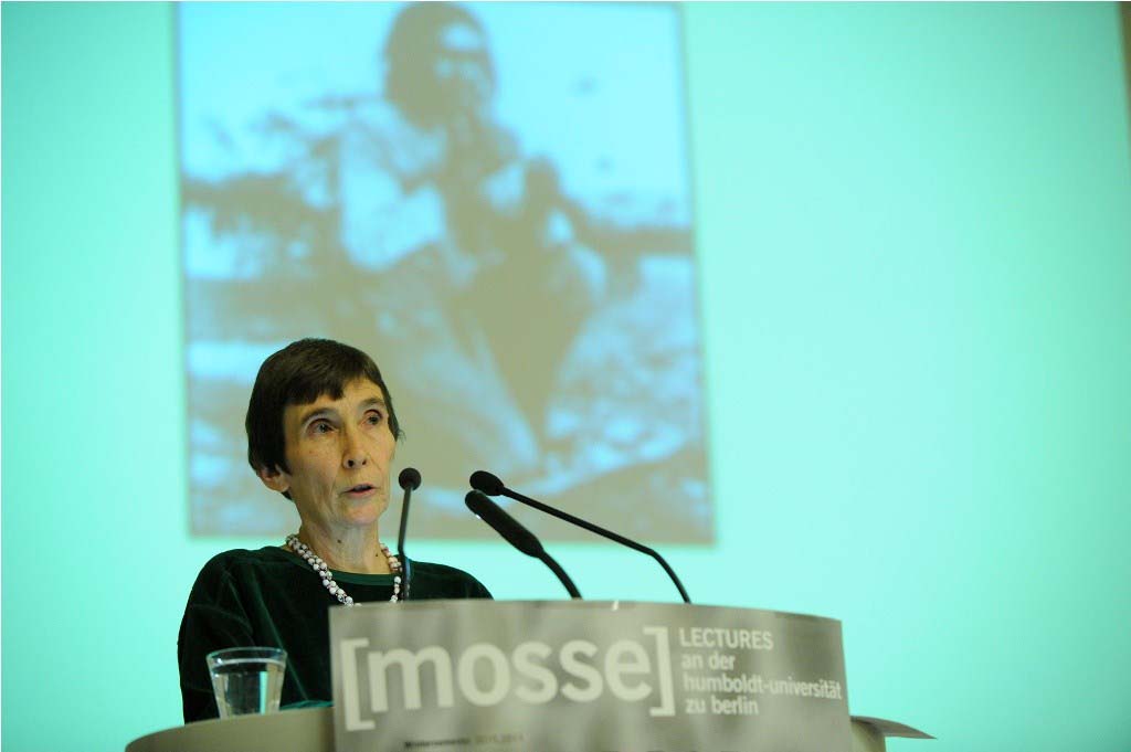 Romaine lectures from the podium