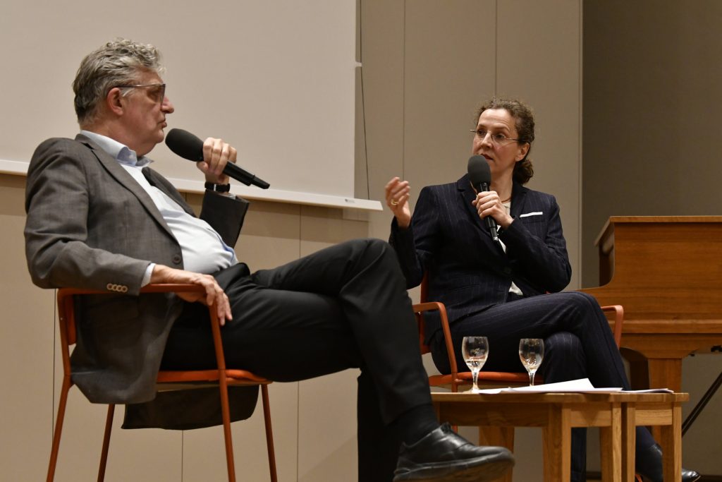 Müller and Kaiser in conversation
