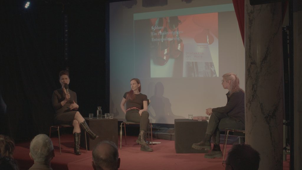 Becker, Gellai, and de Rivière in conversation